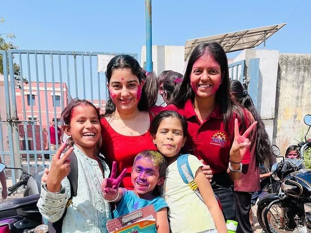 Children celebrating an educational milestone at Umeed Foundation